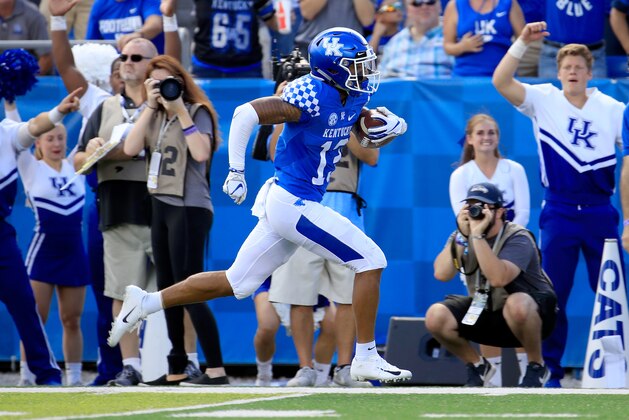 LEXINGTON, KY - SEPTEMBER 15: Zy'Aire Hughes #13 of the Kentucky Wildcats runs for a touchdown against the Murray State Racers at Commonwealth Stadium on September 15, 2018 in Lexington, Kentucky.  (Photo by Andy Lyons/Getty Images)