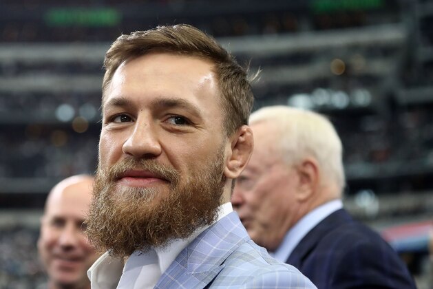 ARLINGTON, TX - OCTOBER 14:  Conor McGregor is seen on the sidelines before the NFL game between the Jacksonville Jaguars and Dallas Cowboys at AT&T Stadium on October 14, 2018 in Arlington, Texas.  (Photo by Ronald Martinez/Getty Images)