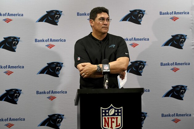 FILE - In this Dec. 2, 2018, file photo, Carolina Panthers head coach Ron Rivera talks with the media following an NFL football game against the Tampa Bay Buccaneers, in Tampa, Fla. Rivera will take over defensive play calls from coordinator Eric Washington following the team’s four-game losing streak. The Panthers also fired defensive line coach Brady Hoke and assistant secondary/cornerbacks coach Jeff Imamura. The moves were announced after Rivera met with new owner David Tepper and general manager Marty Hurney on Monday morning, Dec. 3, 2018. (AP Photo/Jason Behnken, File)