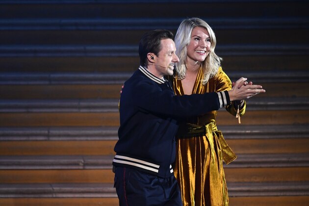 Olympique Lyonnais' Norwegian forward Ada Hegerberg (R) dances with French DJ and producer Martin Solveig after receiving the 2018 FIFA Women's Ballon d'Or award for best player of the year during the 2018 FIFA Ballon d'Or award ceremony at the Grand Palais in Paris on December 3, 2018. - The winner of the 2018 Ballon d'Or will be revealed at a glittering ceremony in Paris on December 3 evening, with Croatia's Luka Modric and a host of French World Cup winners all hoping to finally end the 10-year duopoly of Cristiano Ronaldo and Lionel Messi. (Photo by FRANCK FIFE / AFP)        (Photo credit should read FRANCK FIFE/AFP/Getty Images)