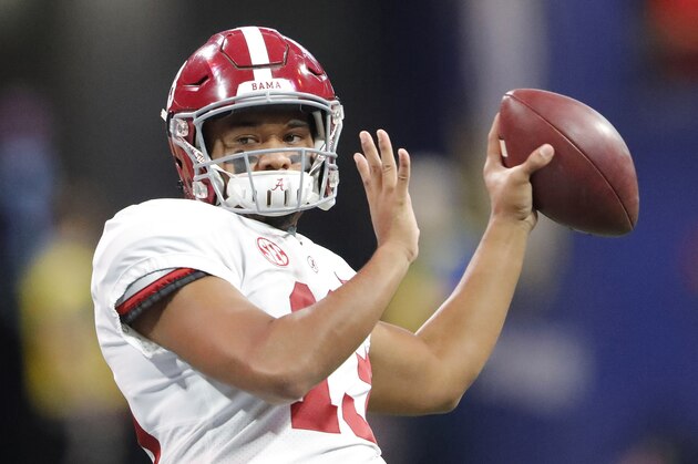 Alabama quarterback Tua Tagovailoa (13) warms up ahead of the Southeastern Conference championship NCAA college football game between Georgia and Alabama, Saturday, Dec. 1, 2018, in Atlanta. (AP Photo/John Bazemore)