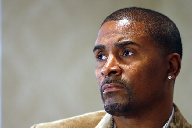 Eric Murdock listens during a news conference in East Hanover, N.J., Friday, April 5, 2013. Murdock, a former Rutgers empoyee who made public the video that led to the basketball coach's dismissal and athletic director's resignation, has filed a whistleblower lawsuit against the university. Murdock filed the lawsuit Friday in state court, claiming the university violated the state's employee protection act and his contract. (AP Photo/Rich Schultz)