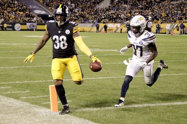 Pittsburgh Steelers running back Jaylen Samuels (38) beats Los Angeles Chargers strong safety Jahleel Addae (37) to the end zone for a touchdown in the second half of an NFL football game, Sunday, Dec. 2, 2018, in Pittsburgh. (AP Photo/Gene J. Puskar)