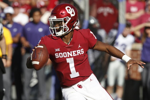 File - In this Oct. 27, 2018, file photo, Oklahoma quarterback Kyler Murray (1) maneuvers during an NCAA college football game against Kansas State in Norman, Okla. What figures to be Murray’s one-and-done attempt to get No. 7 Oklahoma back to the College Football Playoff will require a win in an atmosphere significantly more hostile because of a prime-time kickoff. (AP Photo/Sue Ogrocki, File)
