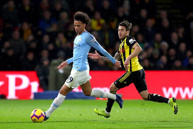 WATFORD, ENGLAND - DECEMBER 04:  Leroy Sane of Manchester City runs with the ball under pressure from Kiko Femenia of Watford during the Premier League match between Watford FC and Manchester City at Vicarage Road on December 4, 2018 in Watford, United Kingdom.  (Photo by Catherine Ivill/Getty Images)