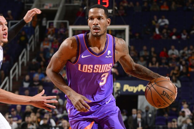 PHOENIX, AZ - NOVEMBER 30: Trevor Ariza #3 of the Phoenix Suns handles the ball against the Orlando Magic on November 30, 2018 at Talking Stick Resort Arena in Phoenix, Arizona. NOTE TO USER: User expressly acknowledges and agrees that, by downloading and/or using this photograph, user is consenting to the terms and conditions of the Getty Images License Agreement. Mandatory Copyright Notice: Copyright 2018 NBAE (Photo by Barry Gossage/NBAE via Getty Images)
