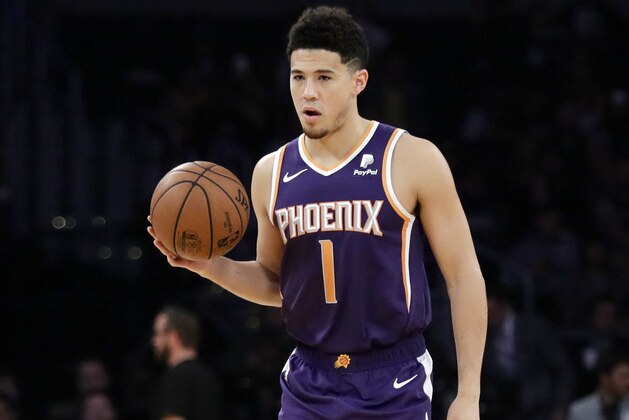 Phoenix Suns' Devin Booker (1) during the first half of an NBA basketball game against the Los Angeles Lakers Sunday, Dec. 2, 2018, in Los Angeles. (AP Photo/Marcio Jose Sanchez)