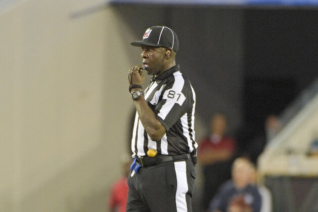 Umpire Roy Ellison (81) blows the whistle during the first half of an NFL football game between the Jacksonville Jaguars and the Tennessee Titans in Jacksonville, Fla., Thursday, Nov. 19, 2015.(AP Photo/Phelan M. Ebenhack)