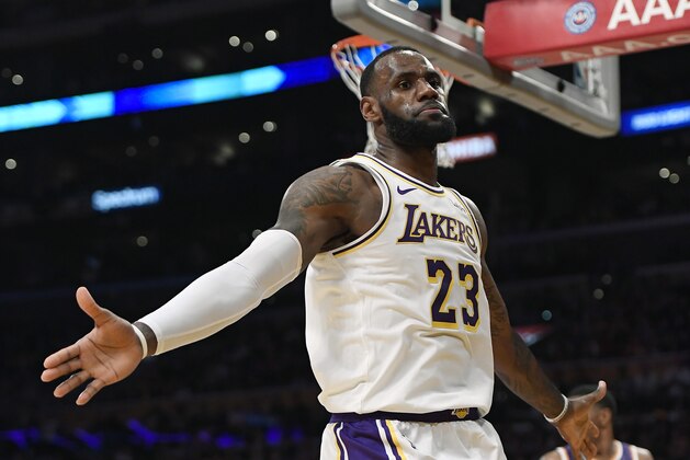 LOS ANGELES, CA - DECEMBER 02: LeBron James #23 of the Los Angeles Lakers celebrates after a slam dunk against the Phoenix Suns during the second half at Staples Center on December 2, 2018 in Los Angeles, California. NOTE TO USER: User expressly acknowledges and agrees that, by downloading and or using this photograph, User is consenting to the terms and conditions of the Getty Images License Agreement. (Photo by Kevork Djansezian/Getty Images)