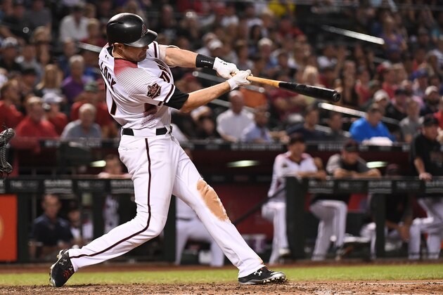 PHOENIX, AZ - SEPTEMBER 26:  A.J. Pollock #11 of the Arizona Diamondbacks hits a three-run home run in the fifth inning of the MLB game against the Los Angeles Dodgers at Chase Field on September 26, 2018 in Phoenix, Arizona.  (Photo by Jennifer Stewart/Getty Images)