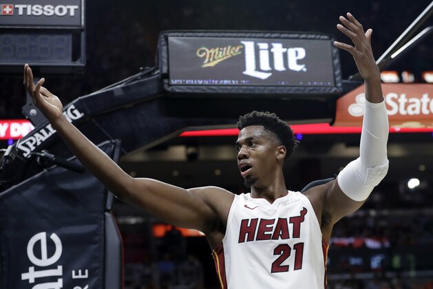 Miami Heat center Hassan Whiteside encourages the crowd during the second half of an NBA basketball game against the New York Knicks, Wednesday, Oct. 24, 2018, in Miami. The Heat won 110-87. (AP Photo/Lynne Sladky)