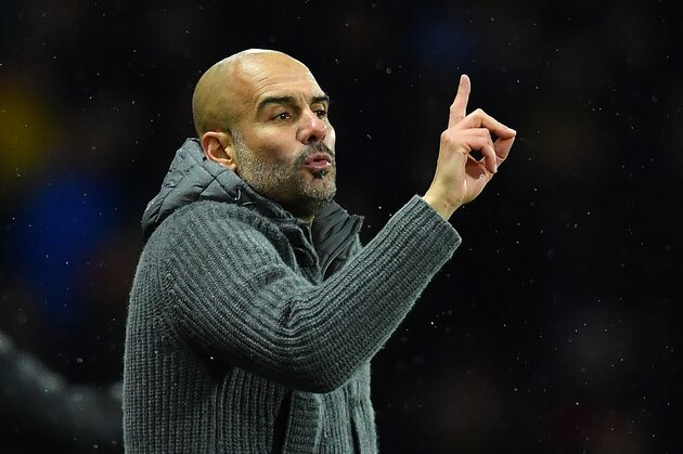 Manchester City's Spanish manager Pep Guardiola shouts instructions to his players from the touchline during the English Premier League football match between Watford and Manchester City at Vicarage Road Stadium in Watford, north of London on December 4, 2018. (Photo by Ben STANSALL / AFP) / RESTRICTED TO EDITORIAL USE. No use with unauthorized audio, video, data, fixture lists, club/league logos or 'live' services. Online in-match use limited to 120 images. An additional 40 images may be used in extra time. No video emulation. Social media in-match use limited to 120 images. An additional 40 images may be used in extra time. No use in betting publications, games or single club/league/player publications. /         (Photo credit should read BEN STANSALL/AFP/Getty Images)