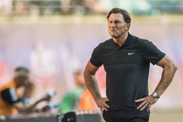 Leipzig's Austrian head coach Ralph Hasenhuettl looks on during the German first division Bundesliga football match between RB Leipzig and TSG Hoffenheim in Leipzig, eastern Germany on April 21, 2018. (Photo by ROBERT MICHAEL / AFP) / RESTRICTIONS: DURING MATCH TIME: DFL RULES TO LIMIT THE ONLINE USAGE TO 15 PICTURES PER MATCH AND FORBID IMAGE SEQUENCES TO SIMULATE VIDEO. == RESTRICTED TO EDITORIAL USE == FOR FURTHER QUERIES PLEASE CONTACT DFL DIRECTLY AT + 49 69 650050 / RESTRICTIONS: DURING MATCH TIME: DFL RULES TO LIMIT THE ONLINE USAGE TO 15 PICTURES PER MATCH AND FORBID IMAGE SEQUENCES TO SIMULATE VIDEO. == RESTRICTED TO EDITORIAL USE == FOR FURTHER QUERIES PLEASE CONTACT DFL DIRECTLY AT + 49 69 650050        (Photo credit should read ROBERT MICHAEL/AFP/Getty Images)
