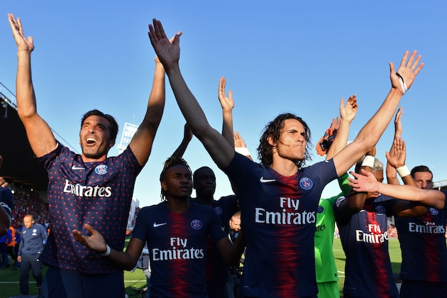 (FromL) Paris Saint-Germain's Italian goalkeeper Gianluigi Buffon, Paris Saint-Germain's French midfielder Christopher Nkunku and Paris Saint-Germain's Uruguayan forward Edinson Cavani celebrate their victory after the French L1 football match between Nimes and Paris Saint-Germain (PSG), on September 1, 2018 at the Costieres stadium in Nimes, southern France. (Photo by Pascal GUYOT / AFP) (Photo credit should read PASCAL GUYOT/AFP/Getty Images) (FromL) Paris Saint-Germain's Italian goalkeeper Gianluigi Buffon, Paris Saint-Germain's French midfielder Christopher Nkunku and Paris Saint-Germain's Uruguayan forward Edinson Cavani celebrate their victory after the French L1 football match between Nimes and Paris Saint-Germain (PSG), on September 1, 2018 at the Costieres stadium in Nimes, southern France. (Photo by Pascal GUYOT / AFP) (Photo credit should read PASCAL GUYOT/AFP/Getty Images)