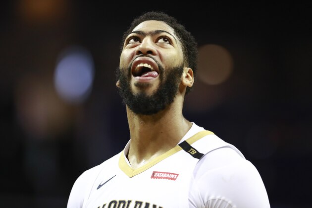 New Orleans Pelicans center Anthony Davis looks at the scoreboard while facing the Charlotte Hornets in the second half of an NBA basketball game Sunday, Dec. 2, 2018, in Charlotte, N.C. New Orleans won 119 to 109. (AP Photo/Jason E. Miczek)