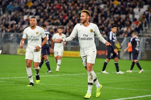Paris Saint-Germain's Brazilian forward Neymar celebrates after scoring a goal during the French L1 football match Bordeaux vs Paris Saint-Germain (PSG), on December 2, 2018 in Bordeaux, southwestern France. (Photo by NICOLAS TUCAT / AFP)        (Photo credit should read NICOLAS TUCAT/AFP/Getty Images)