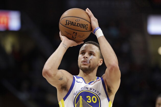 Golden State Warriors' Stephen Curry shoots in the second half of an NBA basketball game against the Cleveland Cavaliers, Wednesday, Dec. 5, 2018, in Cleveland. (AP Photo/Tony Dejak)