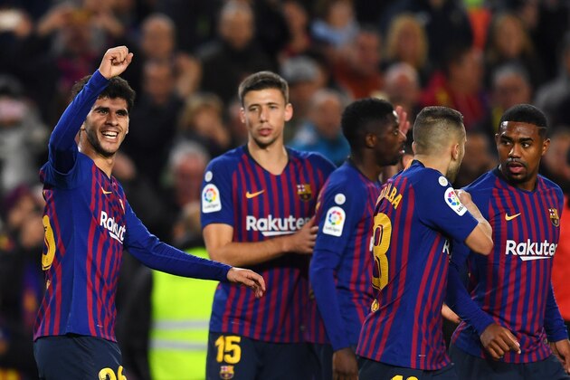 BARCELONA, SPAIN - DECEMBER 02:  Carles Alena of Barcelona (L) celebrates as he scores his team's second goal with team mates during the La Liga match between FC Barcelona and Villarreal CF at Camp Nou on December 2, 2018 in Barcelona, Spain.  (Photo by David Ramos/Getty Images)