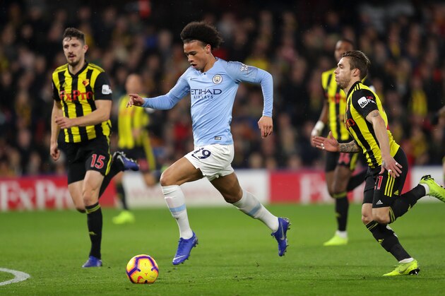 WATFORD, ENGLAND - DECEMBER 04: Leroy Sané of Man City goes past Kiko Femenia of Watford during the Premier League match between Watford FC and Manchester City at Vicarage Road on December 04, 2018 in Watford, United Kingdom. (Photo by Richard Heathcote/Getty Images)