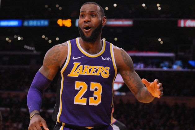 LOS ANGELES, CA - DECEMBER 05:  LeBron James #23 of the Los Angeles Lakers reacts after his blocking foul during a 121-113 win over the San Antonio Spurs at Staples Center on December 5, 2018 in Los Angeles, California.  NOTE TO USER: User expressly acknowledges and agrees that, by downloading and or using this photograph, User is consenting to the terms and conditions of the Getty Images License Agreement.  (Photo by Harry How/Getty Images)