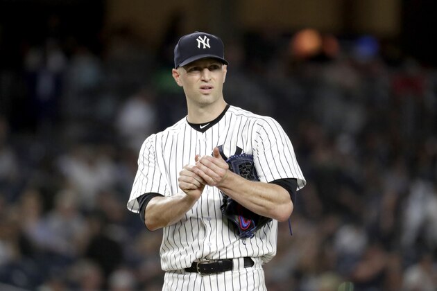 New York Yankees starting pitcher J.A. Happ prepares to throw to the Boston Red Sox during the first inning of a baseball game, Tuesday, Sept. 18, 2018, in New York. (AP Photo/Julio Cortez)