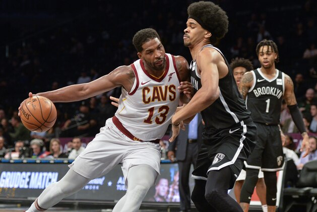 Cleveland Cavaliers center Tristan Thompson (13) pushes in on Brooklyn Nets guard Allen Crabbe (33) in the first half of an NBA basketball game, Monday, Dec. 3, 2018, in New York. (AP Photo/Howard Simmons) Cleveland Cavaliers center Tristan Thompson (13) pushes in on Brooklyn Nets guard Allen Crabbe (33) in the first half of an NBA basketball game, Monday, Dec. 3, 2018, in New York. (AP Photo/Howard Simmons)