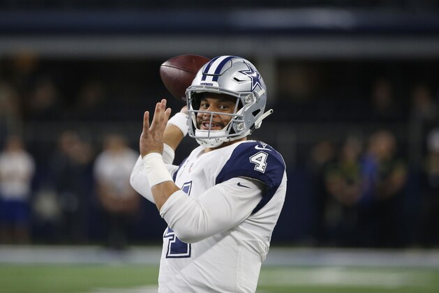 Dallas Cowboys quarterback Dak Prescott (4) throws before an NFL football game, in Arlington, Texas, Thursday, Nov. 29, 2018. (AP Photo/Ron Jenkins)