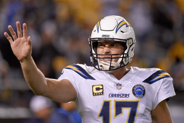 Los Angeles Chargers quarterback Philip Rivers (17) warms up before an NFL football game against the Pittsburgh Steelers, Monday, Dec. 3, 2018, in Pittsburgh. (AP Photo/Don Wright)