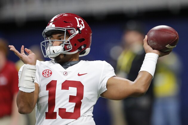 Alabama quarterback Tua Tagovailoa (13) warms up ahead of the Southeastern Conference championship NCAA college football game between Georgia and Alabama, Saturday, Dec. 1, 2018, in Atlanta. (AP Photo/John Bazemore)