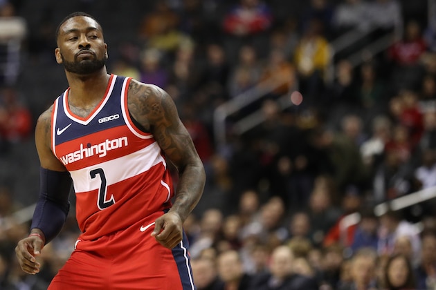 WASHINGTON, DC - DECEMBER 01:  John Wall #2 of the Washington Wizards reacts against the Brooklyn Nets during the first half at Capital One Arena on December 01, 2018 in Washington, DC. NOTE TO USER: User expressly acknowledges and agrees that, by downloading and or using this photograph, User is consenting to the terms and conditions of the Getty Images License Agreement. (Photo by Patrick Smith/Getty Images)