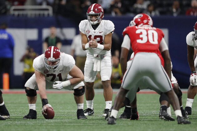 Alabama quarterback Tua Tagovailoa (13) works against Georgia during the second half of the Southeastern Conference championship NCAA college football game, Saturday, Dec. 1, 2018, in Atlanta. (AP Photo/John Bazemore) Alabama quarterback Tua Tagovailoa (13) works against Georgia during the second half of the Southeastern Conference championship NCAA college football game, Saturday, Dec. 1, 2018, in Atlanta. (AP Photo/John Bazemore)