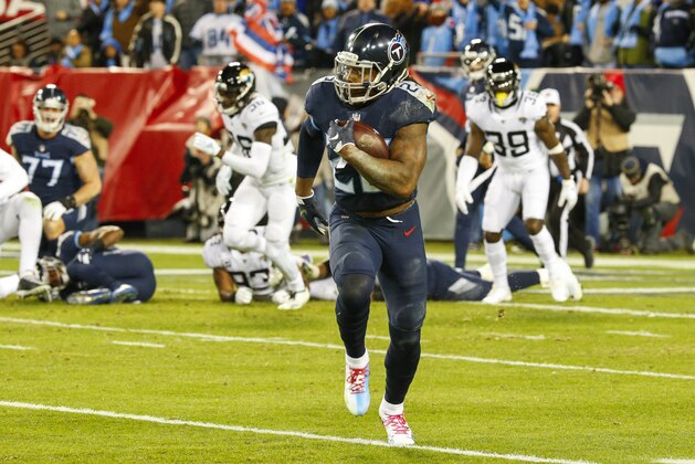 NASHVILLE, TN - DECEMBER 6: Derrick Henry #22 of the Tennessee Titans runs downfield with the ball for a 99 yard touchdown against the Jacksonville Jaguars at Nissan Stadium on December 6, 2018 in Nashville, Tennessee. (Photo by Frederick Breedon/Getty Images)