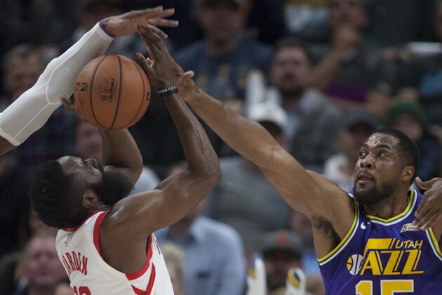 SALT LAKE CITY, UT -  DECEMBER 6: Derrick Favors #15 of the Utah Jazz blocks a shot by James Harden #13 of the Houston Rockets during their game at the Vivint Smart Home Arena on December 6, 2018 in Salt Lake City , Utah. (Photo by Chris Gardner/Getty Images)