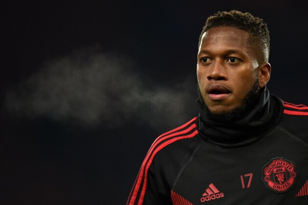 Manchester United's Brazilian midfielder Fred warms up ahead of the UEFA Champions League group H football match between Manchester United and Young Boys at Old Trafford in Manchester, north-west England on November 27, 2018. (Photo by Oli SCARFF / AFP)        (Photo credit should read OLI SCARFF/AFP/Getty Images)