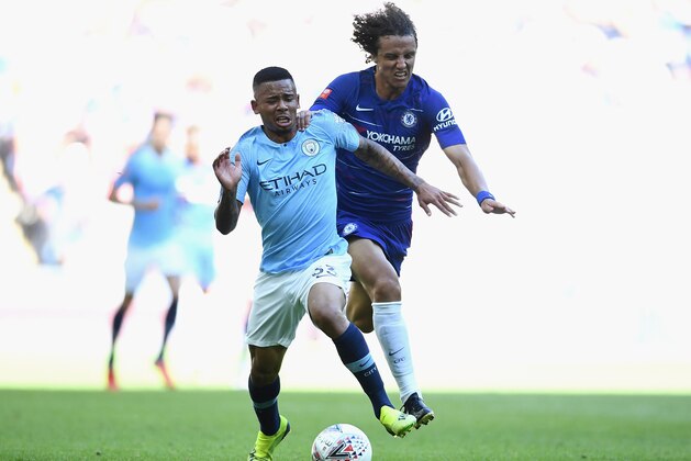 LONDON, ENGLAND - AUGUST 05: Gabriel Jesus of Manchester City holds off David Luiz of Chelsea during the FA Community Shield match between Manchester City and Chelsea at Wembley Stadium on August 5, 2018 in London, England. (Photo by Clive Mason/Getty Images) LONDON, ENGLAND - AUGUST 05: Gabriel Jesus of Manchester City holds off David Luiz of Chelsea during the FA Community Shield match between Manchester City and Chelsea at Wembley Stadium on August 5, 2018 in London, England. (Photo by Clive Mason/Getty Images)