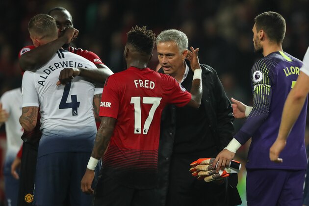 MANCHESTER, ENGLAND - AUGUST 27: Fred of Manchester United and Manchester United Manager \ Head Coach Jose Mourinho at full time during the Premier League match between Manchester United and Tottenham Hotspur at Old Trafford on August 27, 2018 in Manchester, United Kingdom. (Photo by Matthew Ashton - AMA/Getty Images)