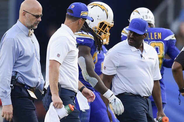 Los Angeles Chargers running back Melvin Gordon is helped off the field during the second half of an NFL football game against the Arizona Cardinals Sunday, Nov. 25, 2018, in Carson, Calif. (AP Photo/Kelvin Kuo )