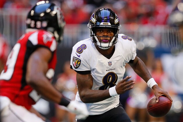 ATLANTA, GA - DECEMBER 02:  Lamar Jackson #8 of the Baltimore Ravens rushes the ball against the Atlanta Falcons at Mercedes-Benz Stadium on December 2, 2018 in Atlanta, Georgia.  (Photo by Kevin C. Cox/Getty Images)