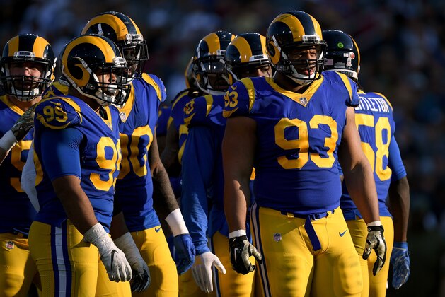 LOS ANGELES, CA - NOVEMBER 11:  Aaron Donald #99 and Ndamukong Suh #93 of the Los Angeles Rams wait during a 36-31 win over the Seattle Seahawks at Los Angeles Memorial Coliseum on November 11, 2018 in Los Angeles, California.  (Photo by Harry How/Getty Images)