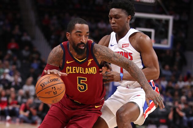 DETROIT, MICHIGAN - NOVEMBER 19:  JR Smith #5 of the Cleveland Cavaliers tries to drive around Stanley Johnson #7 of the Detroit Pistons during the first half at Little Caesars Arena on November 19, 2018 in Detroit, Michigan. (Photo by Gregory Shamus/Getty Images)