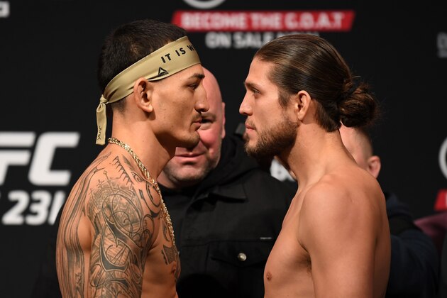 TORONTO, CANADA - DECEMBER 07:  (L-R) Opponents Max Holloway and Brian Ortega face-off during the UFC 231 weigh-in at Scotiabank Arena on December 7, 2018 in Toronto, Canada. (Photo by Josh Hedges/Zuffa LLC/Zuffa LLC via Getty Images)