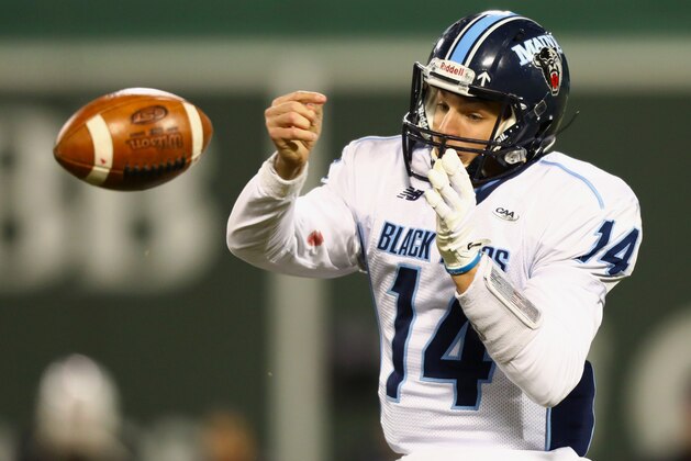 BOSTON, MA - NOVEMBER 11: Quarter back Chris Ferguson #14 of the Maine Black Bears fumbles an incomplete pass during the second half of the game against the Massachusetts Minutemen at Fenway Park on November 11, 2017 in Boston, Massachusetts. (Photo by Omar Rawlings/Getty Images) BOSTON, MA - NOVEMBER 11: Quarter back Chris Ferguson #14 of the Maine Black Bears fumbles an incomplete pass during the second half of the game against the Massachusetts Minutemen at Fenway Park on November 11, 2017 in Boston, Massachusetts. (Photo by Omar Rawlings/Getty Images)