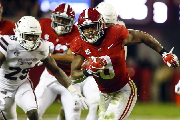 Alabama running back Josh Jacobs (8) carries the ball during the second half of an NCAA college football game against Mississippi State, Saturday, Nov. 10, 2018, in Tuscaloosa, Ala. Alabama won 24-0. (AP Photo/Butch Dill)
