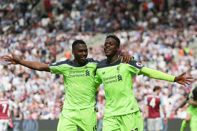 Liverpool's English striker Daniel Sturridge (L) and Liverpool's Belgian striker Divock Origi celebrate their fourth goal during the English Premier League football match between West Ham United and Liverpool at The London Stadium, in east London on May 14, 2017.n on May 14, 2017. / AFP PHOTO / Daniel LEAL-OLIVAS / RESTRICTED TO EDITORIAL USE. No use with unauthorized audio, video, data, fixture lists, club/league logos or 'live' services. Online in-match use limited to 75 images, no video emulation. No use in betting, games or single club/league/player publications.  /         (Photo credit should read DANIEL LEAL-OLIVAS/AFP/Getty Images)