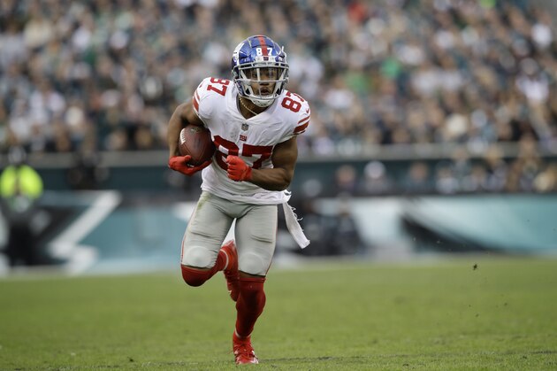 New York Giants' Sterling Shepard runs with the ball during the second half of an NFL football game against the Philadelphia Eagles, Sunday, Nov. 25, 2018, in Philadelphia. (AP Photo/Michael Perez)
