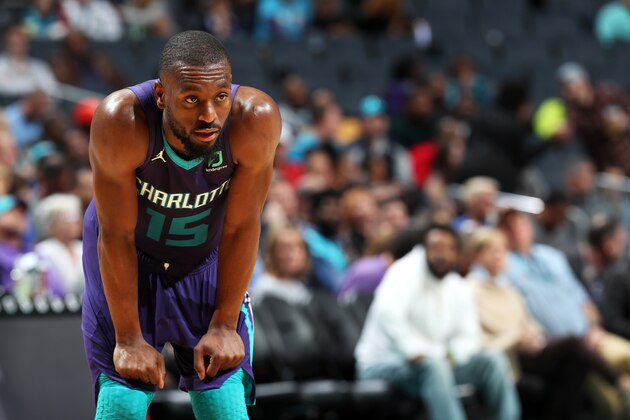 CHARLOTTE, NC - DECEMBER 2:  Kemba Walker #15 of the Charlotte Hornets looks on during the game against the New Orleans Pelicans on December 2, 2018 at Spectrum Center in Charlotte, North Carolina. NOTE TO USER: User expressly acknowledges and agrees that, by downloading and or using this photograph, User is consenting to the terms and conditions of the Getty Images License Agreement.  Mandatory Copyright Notice:  Copyright 2018 NBAE (Photo by Kent Smith/NBAE via Getty Images)
