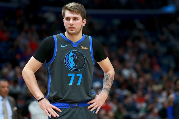 NEW ORLEANS, LOUISIANA - DECEMBER 05: Luka Doncic #77 of the Dallas Mavericks stands on the court during a NBA game against the New Orleans Pelicans at the Smoothie King Center on December 05, 2018 in New Orleans, Louisiana. NOTE TO USER: User expressly acknowledges and agrees that, by downloading and or using this photograph, User is consenting to the terms and conditions of the Getty Images License Agreement. (Photo by Sean Gardner/Getty Images)