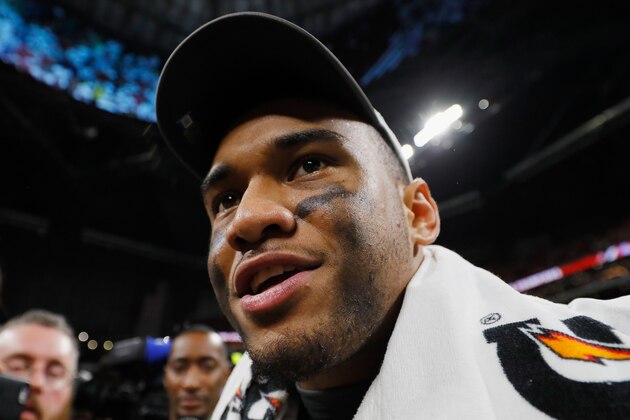 ATLANTA, GA - DECEMBER 01:  Tua Tagovailoa #13 of the Alabama Crimson Tide walks on the field after defeating the Georgia Bulldogs 35-28 in the 2018 SEC Championship Game at Mercedes-Benz Stadium on December 1, 2018 in Atlanta, Georgia.  (Photo by Kevin C. Cox/Getty Images)