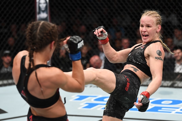 TORONTO, CANADA - DECEMBER 08:  (R-L) Valentina Shevchenko of Kyrgyzstan kicks Joanna Jedrzejczyk of Poland in their UFC strawweight championship fight during the UFC 231 event at Scotiabank Arena on December 8, 2018 in Toronto, Canada. (Photo by Josh Hedges/Zuffa LLC/Zuffa LLC via Getty Images)