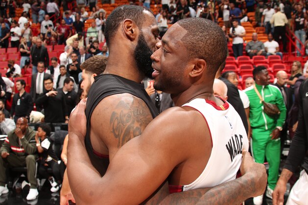 MIAMI, FL - MARCH 27: LeBron James #23 of the Cleveland Cavaliers and Dwyane Wade #3 of the Miami Heat hug after the game on March 27, 2018 at American Airlines Arena in Miami, Florida. NOTE TO USER: User expressly acknowledges and agrees that, by downloading and or using this Photograph, user is consenting to the terms and conditions of the Getty Images License Agreement. Mandatory Copyright Notice: Copyright 2018 NBAE (Photo by Issac Baldizon/NBAE via Getty Images)